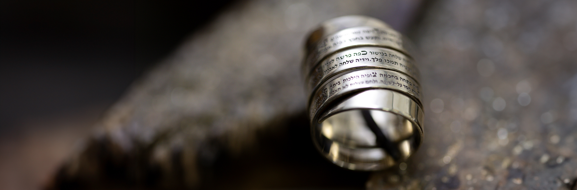 Sterling silver ring engraved with verses from Woman of Valor - handmade Hebrew jewelry